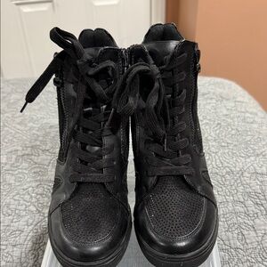 Italina Sleek Black Lace-Up Wedge Boots